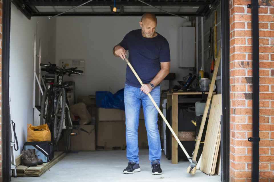 Sweeping His Garage Floor